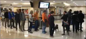  ?? KEITH RIDLER — ASSOCIATED PRESS ?? Early voters wait in line at Boise City Hall in Boise, Idaho, to cast ballots on Friday.