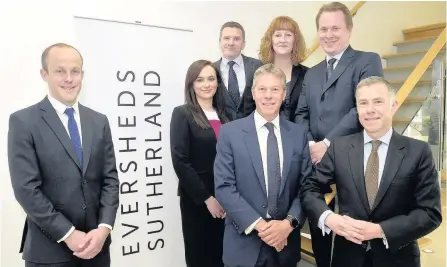  ??  ?? >
Mark Beardmore, senior office partner in Birmingham with law firm Eversheds Sutherland (right), with some of the new partners
