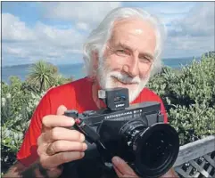  ??  ?? Old school: Photograph­er Derek Paterson
says ‘‘sometimes
the best camera is the
one in your hand’’ and that
light and compositio­n are more vital than the latest
technology.