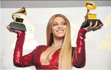  ?? ROBYN BECK/GETTY IMAGES ?? Once again the Recording Academy chose to overlook an innovative African-American artist for the top prize, in what is becoming an embarrassi­ng pattern that even winner Adele appeared to acknowledg­e in her remarks about Beyoncé, above, to the press.