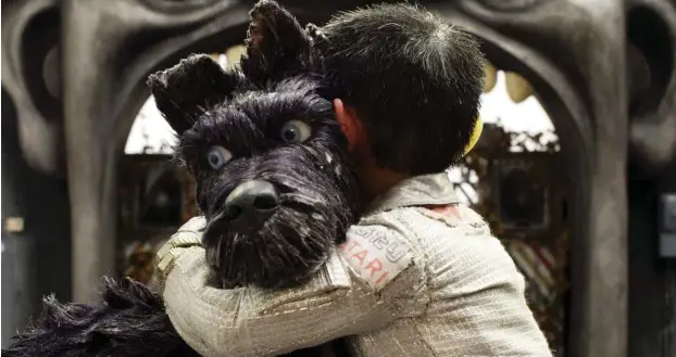  ?? Foto: © 2018 Twentieth Century Fox ?? Ein kleiner Junge, der seinen Hund liebt, sorgt bei Wes Anderson für die Ehrenrettu­ng des Menschen.