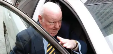  ?? The Canadian Prerss ?? Senator Mike Duffy leaves an Ottawa courthouse on Wednesday. He is suing the Senate over a suspension in 2013.