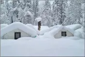  ?? NATIONAL PARK SERVICE VIA AP ?? Tents at Curry Village are covered with snow in Yosemite National Park.