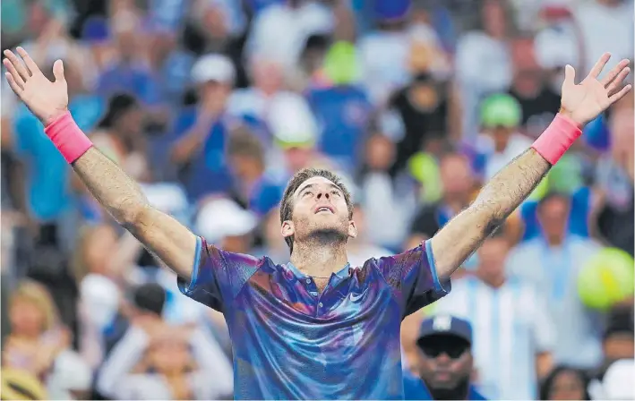  ?? AFP ?? Lo hizo otra vez. Del Potro y su desahogo mirando al cielo. Con buen tenis y una gran dosis de coraje sacó adelante el partido. “Lo gané más con el corazón que con otra cosa”, dijo.