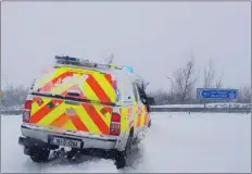  ??  ?? Courtown/Arklow Coast Guard Unit driving through snow drifts.