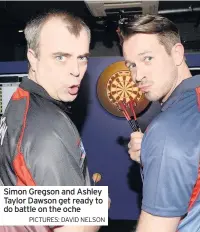  ?? PICTURES: DAVID NELSON ?? Simon Gregson and Ashley Taylor Dawson get ready to do battle on the oche