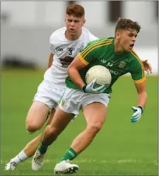  ??  ?? Luke Kelly in action against Kildare’s Seán Hill.