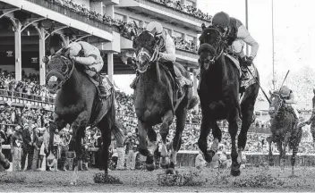  ?? Skip Dickstein / Albany Times Union ?? Medina Spirit, right, with jockey John Velazquez aboard, quickly set the line behind him and didn’t relent despite pressure en route to winning the Kentucky Derby on Saturday at Churchill Downs in Louisville, Ky.