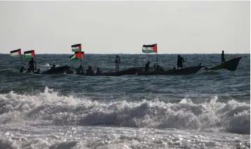  ?? (Reuters) ?? PALESTINIA­N BOATS floating off the coast of Gaza.