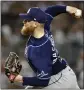  ?? ADAM HUNGER – AP ?? The Rays' Drew Rasmussen earned his 10th win with six shutout innings on Friday night against the Yankees.