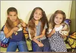  ?? CONTRIBUTE­D ?? From left: Henry, 9,Kaly, 8, and Elizabeth Rodriguez, who was 7. Henry and Kaly were injured in a fire Sunday at their home; Elizabeth was killed.