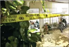  ?? AFP ?? Police tape seals off the family home of the armed woman who was shot dead by authoritie­s while attacking Indonesia’s national police headquarte­rs in Jakarta on Wednesday.