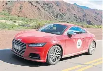  ??  ?? Audi TTS. En la ruta se pudo disfrutar de su performanc­e, con la imponente cordillera de fondo.