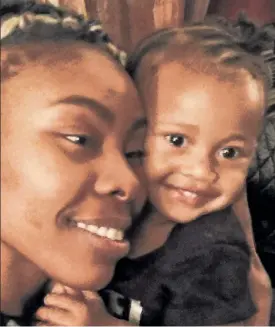  ??  ?? REUNITED: Jazmine Headley embraces her adorable son, Damone Buckman, Tuesday night. Cops had wrested the boy from her (below left) Friday.
