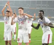  ??  ?? Mohun Bagan players celebrate their 2-1 win over East Bengal in their I-League match in Kolkata on Sunday.