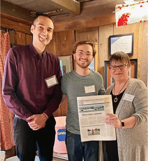  ??  ?? } (From left to right) Editor J.W. Oliver, administra­tive assistant Sam Allen, and director of developmen­t and operations Janice Thompson pose with the first issue of the revived Harpswell Anchor. (Photo provided)