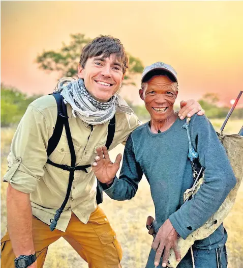  ?? ?? ‘I’m amazed I’m still on telly. I totally understand that I’ll lose my lovely gig – but I’ll hold on as long as I can’ i Kalahari encounter: Simon Reeve with Tui, a hunter from the San ethnic group, in the new series