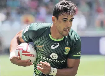  ??  ?? HARD RUNNER: Chris Dry scored a brace against during the pool match against Canada at the Paris Sevens yesterday.