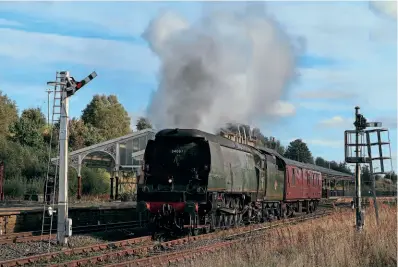  ?? ?? Running again after five years: Battle of Britain 4-6-2 No. 34067 Tangmere at Hellifield on its October 6 engine and support coach test run from Carnforth. CHRIS GEE