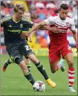  ??  ?? TUSSLE: Patrick Bamford and Jordan Cousins collide