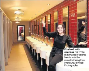  ??  ?? Flushed with success Fair o’Blair shift manager Sophie Morrison in the award-winning loos. Photo:David Webb Photograph­y