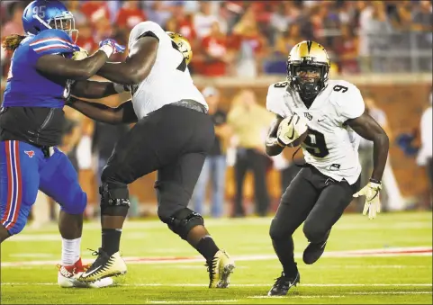  ?? Cooper Neill / Getty Images ?? UCF running back Adrian Killins Jr. (9) is one of the fastest running backs in the country. He ripped off a 96-yard run against Memphis and a 79-yarder against Navy this season.