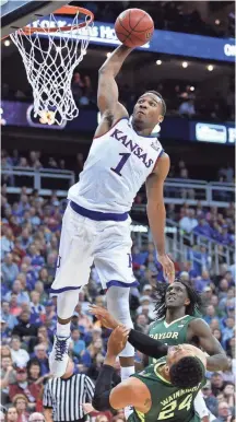  ?? DENNY MEDLEY, USA TODAY SPORTS ?? Wayne Selden Jr., dunking vs. Baylor, says of his improvemen­t this season, “I’m just being aggressive.”