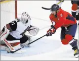  ?? Nick Wass ?? The Associated Press Capitals left wing Alex Ovechkin tries to get the puck past Coyotes goalie Scott Wedgewood in the third period of Washington’s 3-2 overtime win Monday at Capital One Arena.