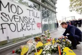  ?? BENOIT DOPPAGNE/BELGA/AFP VIA GETTY IMAGES ?? Prime Minister Ulf Kristersso­n of Sweden paid tribute to two Swedes in Brussels who were slain by a gunman on Monday.