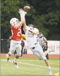  ?? Lindsay Perry / For Hearst Connecticu­t Media ?? Greenwich’s Nick Veronis blocks a pass intended for Trumbull’s Kyle Atherton on Sept. 8.