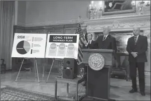  ?? The Associated Press ?? FUNDING PLAN: Arkansas Gov. Asa Hutchinson speaks at the state Capitol in Little Rock, on Monday, about his proposed highway funding plan.