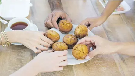  ??  ?? Tasty baked treats like cupcakes are often readily available during meetings at the office, but when you combine those extra calories with long hours filled with little or no physical movement, the weight can start to pile on.