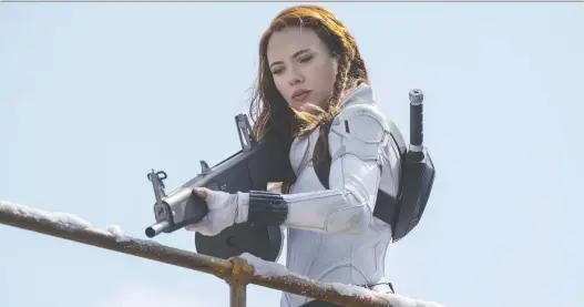  ?? PHOTOS: MARVEL ?? Scarlett Johansson becomes Natasha Romanoff/black Widow once again in an origin story about the character. This time around, she confronts even darker parts of her past.