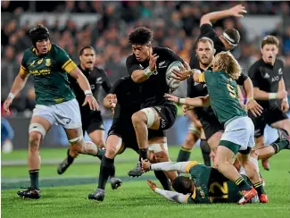  ?? GETTY IMAGES ?? Ardie Savea powers past South African defenders last night.