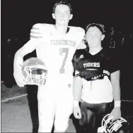  ?? MARK HUMPHREY ENTERPRISE-LEADER ?? Friendship and mutual respect supersedes rivalry on the football field once the final horn sounds. Farmington junior high quarterbac­k Tate Sutton (left) and Prairie Grove wide receiver/defensive back Jackson Sorters have known each other since their...