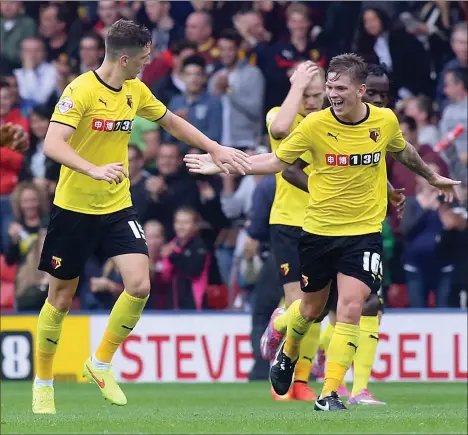 ?? PICTURES: Paul Dennis/TGSPHOTO ?? LATE ARRIVAL: Craig Cathcart enjoys equalising for Watford with seven minutes to go