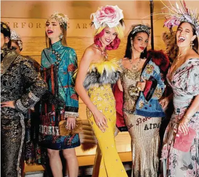  ??  ?? Dolce & Gabbana showed its alta moda collection at the Metropolit­an Opera House on a diverse cast of models.