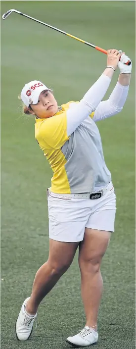  ??  ?? Ariya Jutanugarn plays a shot during the first round of the Founders Cup.