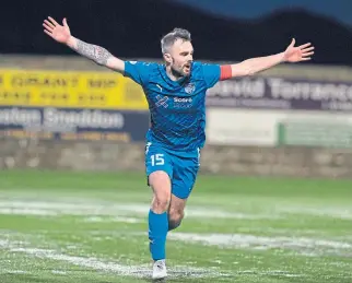  ?? ?? Peterhead’s Scott Ross celebrates after scoring with the last kick of the ball to make the final score 2-2.