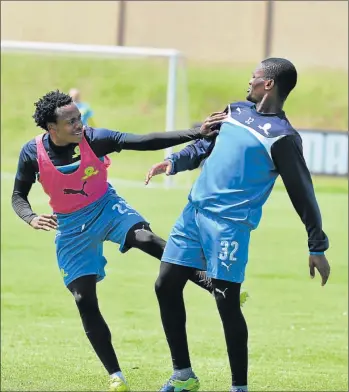  ?? Picture: GALLO IMAGES ?? STILL TRYING: Percy Tau, left, pictured with Motjeka Madisha, will be a good pick for Bafana, says Sundowns club coach Pitso Mosimane