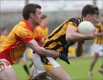  ??  ?? Eoghan Nolan (Shelmalier­s) tries to break away from Con O Donnagáin (Sarsfields) in their Tom Doyle Supplies SFC meeting in Innovate Wexford Park on Saturday.