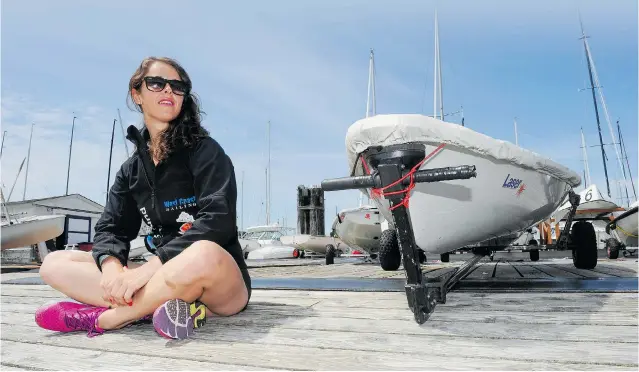  ?? JASON PAYNE/ PNG ?? Isabella Bertold, seen at the Royal Vancouver Yacht Club earlier this month, hopes to compete in the 2016 Summer Olympics and become the first Canadian woman to win a sailing medal.