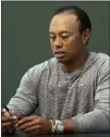  ?? Seth Wenig ?? The Associated Press Tiger Woods, preparing to meet fans at a book signing in New York on May 20, has checked into an in-patient clinic to get help dealing with prescripti­on medication for pain and a sleep disorder, his agent said Tuesday.