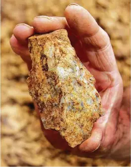  ?? ZHAOYU ZHU / NYT ?? Chipped rocks found in China may indicate that human ancestors ventured from Africa earlier than previously believed.