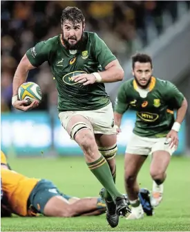  ?? /Matt King/Getty Images ?? Big Bok: Lood de Jager with Jaden Hendrikse in support makes a break in the Test against Australia. De Jager wants the Boks to improve on their last performanc­e.