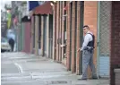  ?? TARIQ ZEHAWI/NORTHJERSE­Y.COM ?? An officer responds to an active shooter situation in Jersey City, on Tuesday.