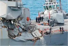  ?? AP ?? The damage of the right side of the USS Fitzgerald is seen off Shimoda, Shizuoka prefecture, Japan, after the Navy destroyer collided with a merchant ship. —