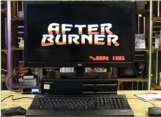  ??  ?? >> YouTuber RetroManCa­ve helping us out with his period-incorrect LCD pounding the legendary AfterBurne­r.