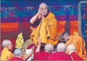 ?? AFP ?? The Dalai Lama is helped from the stage after giving a discourse at Buddha Park in Bomdila, Arunachal Pradesh, on Wednesday.