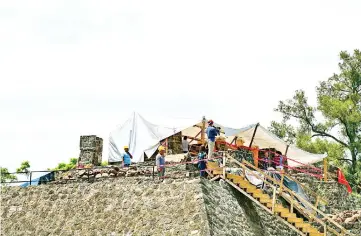  ??  ?? Works take place at the substructu­re inside the Teopanzolc­o pyramid in Cuernavaca, Morelos State, Mexico. — AFP photo